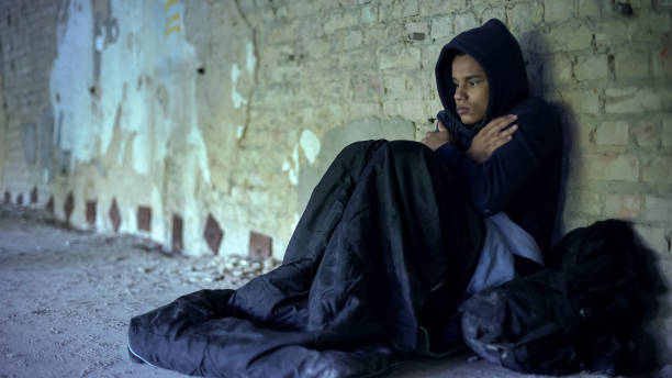 Image of teenager homeless on the street