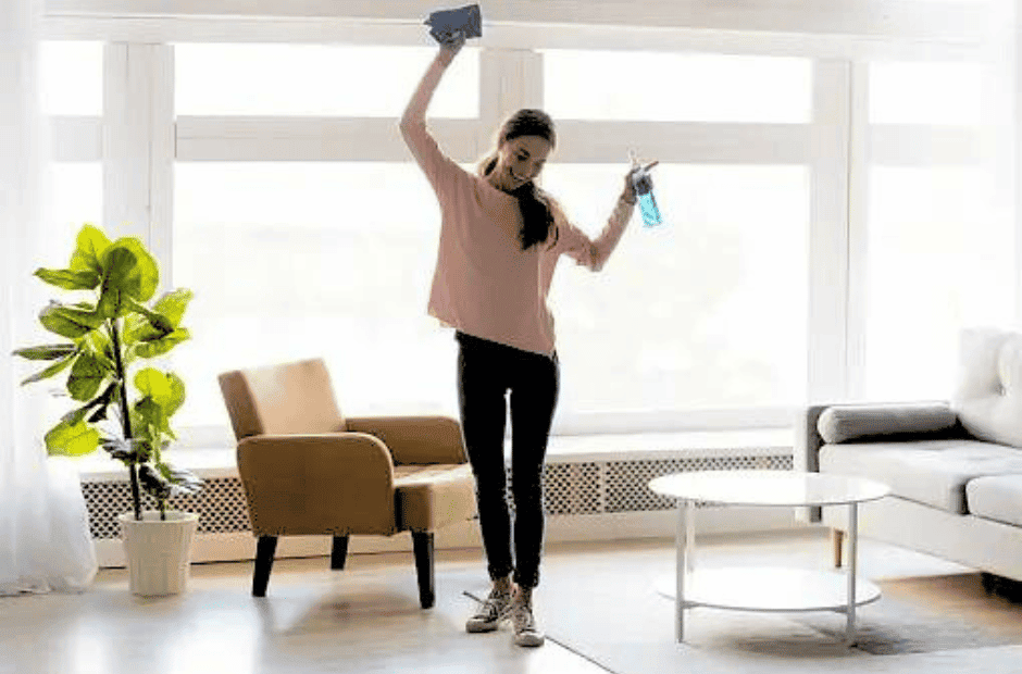 https://www.cleanerguys.com/wp-content/uploads/2023/07/Happy-Woman-Cleaning-Stock-Photo-Apartment-Mold-Ultimate-Guide-Blog-Post.png